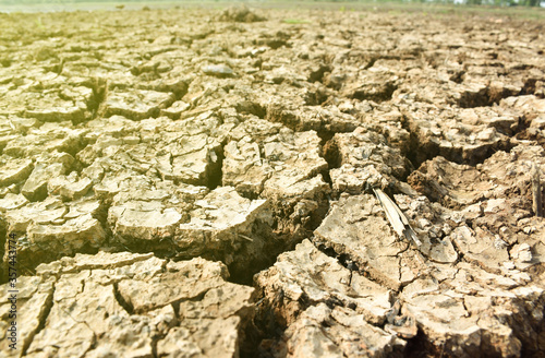 summertime, Drought causes the soil to break apart.Little water left in time of drought.background.Cracked land without water