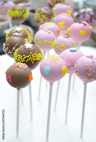 colorful cake pop , chocolate, pink and purple