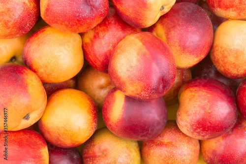 Fresh ripe nectarines background