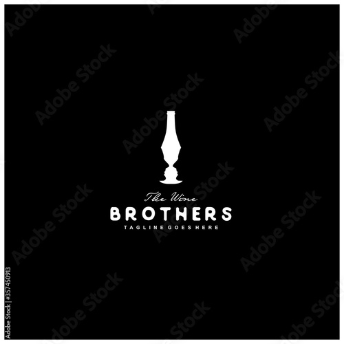 negative space logo wine and the face of a man in a wine bottle