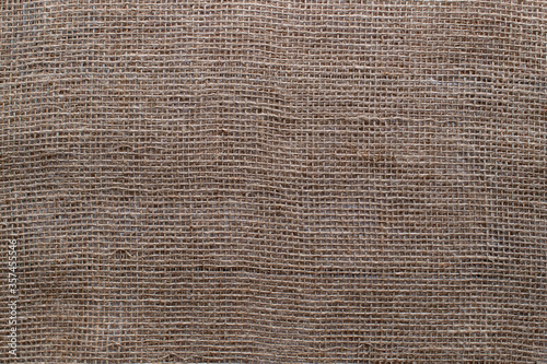 Burlap texture. Coarse weave for sewing bags. Patterns and backgrounds. Coarse weave material