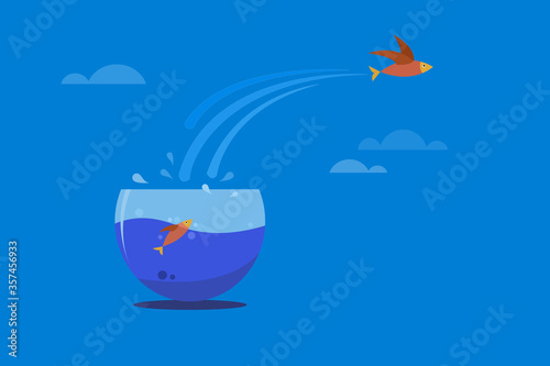 A fish flying out of a bowl. Concept for freedom