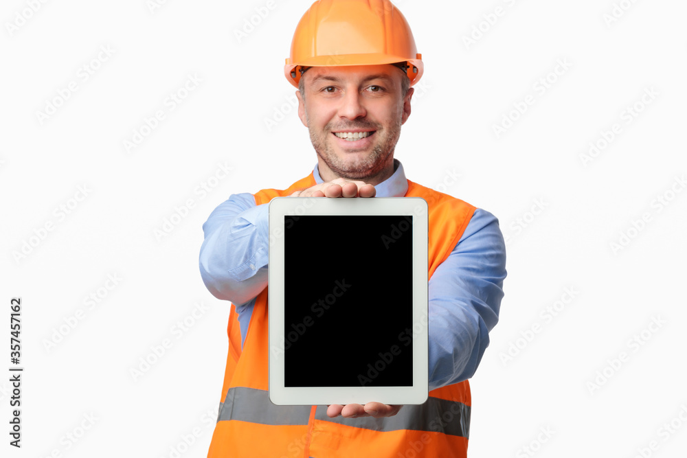Repairman Showing Tablet Empty Screen Standing Over White Studio Background