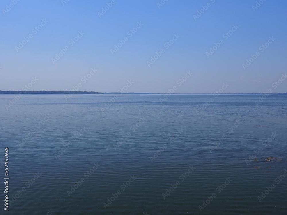 Artificial reservoir in european Goczalkowice town at Silesian district in Poland, clear blue sky in 2020 warm sunny spring day on June.