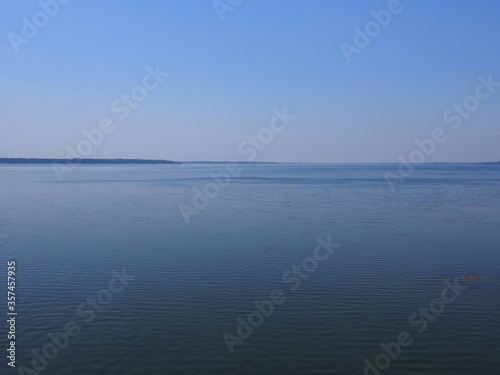 Artificial reservoir in european Goczalkowice town at Silesian district in Poland, clear blue sky in 2020 warm sunny spring day on June.