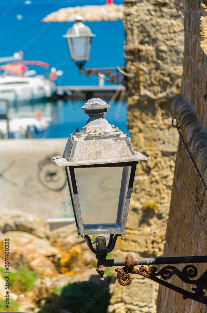 Close up of lampposts in Alghero (Sardinia, Italy).