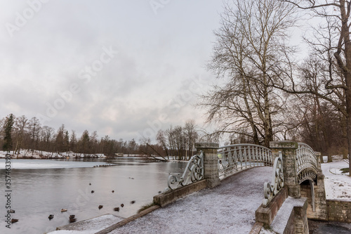 Snowy Winter in Gatchina Palace Park, Russia. Bridge © Александр Хализов