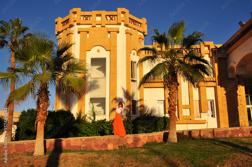 Girl near beautiful building in Sharm El-Sheikh, Egypt