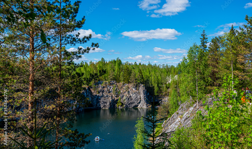 Nature of Karelia. Pines and fir-trees on the shore of lake. Travel to Russia. North Karelia, Russian wild nature.