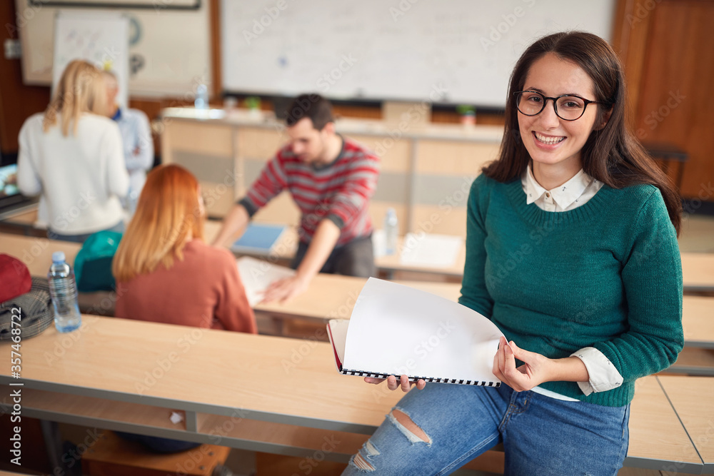 Fototapeta premium Happy student smiling on lecture