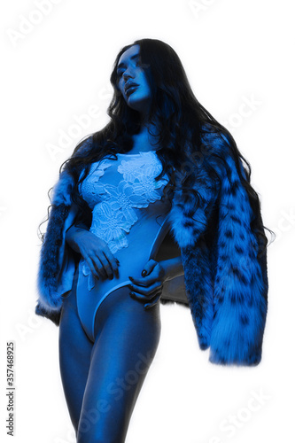 Beauty Fashion Model Girl in Mink Fur Coat Blue color. Beautiful Luxury Winter Woman