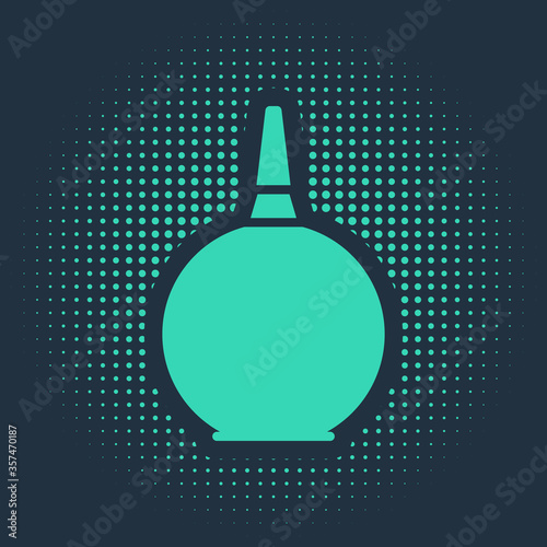 Green Enema icon isolated on blue background. Enema with a plastic tip. Medical pear. Abstract circle random dots. Vector Illustration