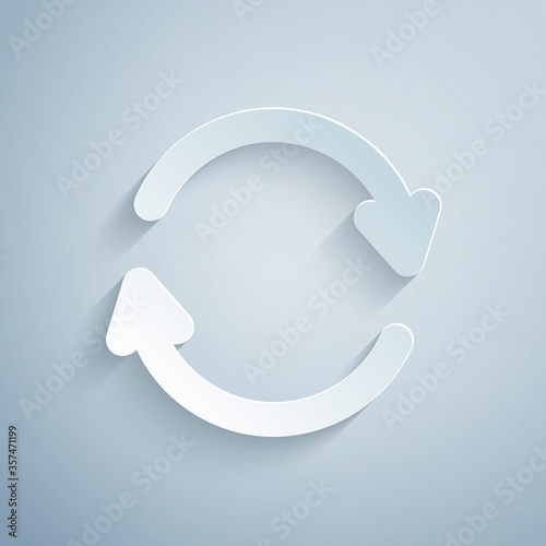 Paper cut Refresh icon isolated on grey background. Reload symbol. Rotation arrows in a circle sign. Paper art style. Vector Illustration
