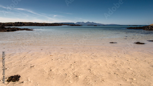 Eigg and Rum from golden beach at Arisaig  photo