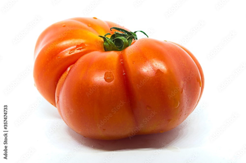 Red raf tomato on white background Fresh vegetable. Healthy eating Red raf tomato on white background Fresh vegetable. Healthy eating