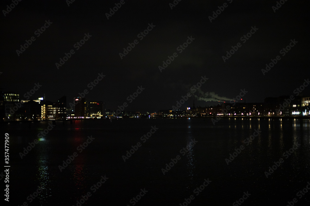 The city from the water bay at night The city from the water bay at night