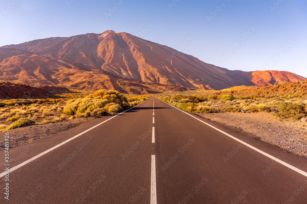 Empty highway road at sunset, El Teide National park. Canary Islands, Spain Empty highway road at sunset, El Teide National park. Canary Islands, Spain