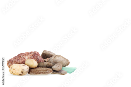 A handful of stones on a white background, banner for the site.