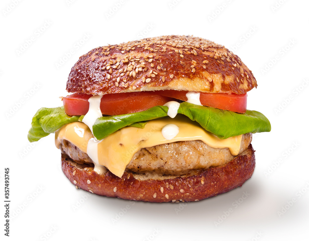 Grilled cheeseburger with melted cheese lettuce tomato front view arrangement with copy space isolated on white background