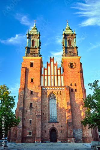 Gothic facade and bell towers of the historic Poznań cathedral.