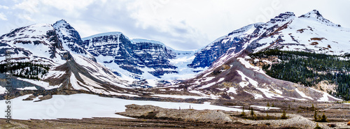 Panorama View of the Columbia Icefields in Jasper National Park, Alberta, Canada at spring time. The famous Snow Dome Glacier on the right