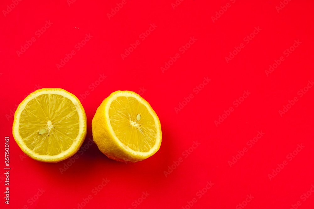 sectional view of lemon on a bright red background, lemon peel, citrus juicy fruit, product for fresh and juices, organic and natural products sectional view of lemon on a bright red background, lemon peel, citrus juicy fruit, product for fresh and juices, organic and natural products