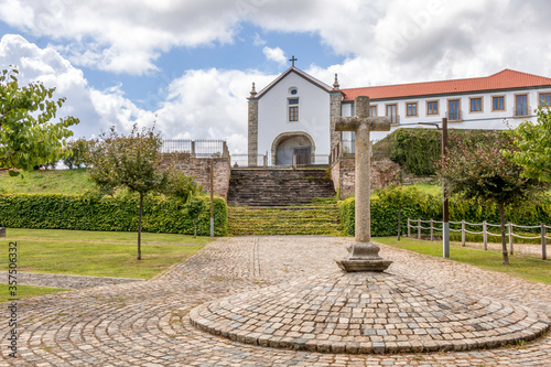 Big cross monument in the front of the catholic church of Sertã photo