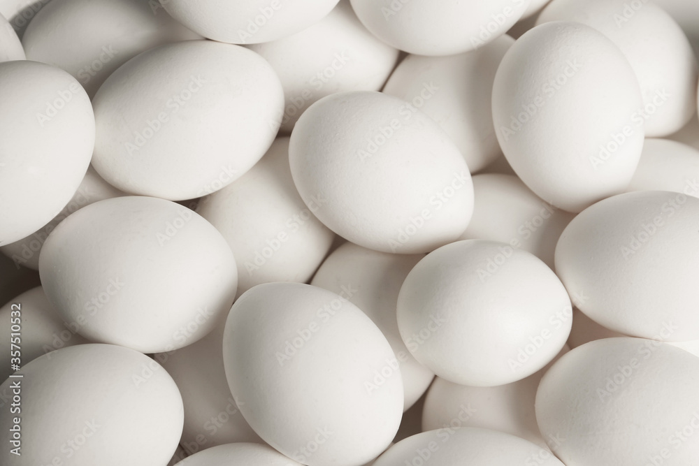 Fresh raw white chicken eggs as background, top view Fresh raw white chicken eggs as background, top view