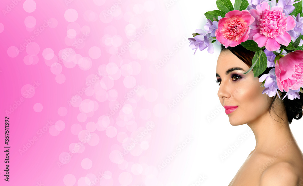 Young woman with beautiful makeup wearing flower wreath on pink background, space for text. Banner design