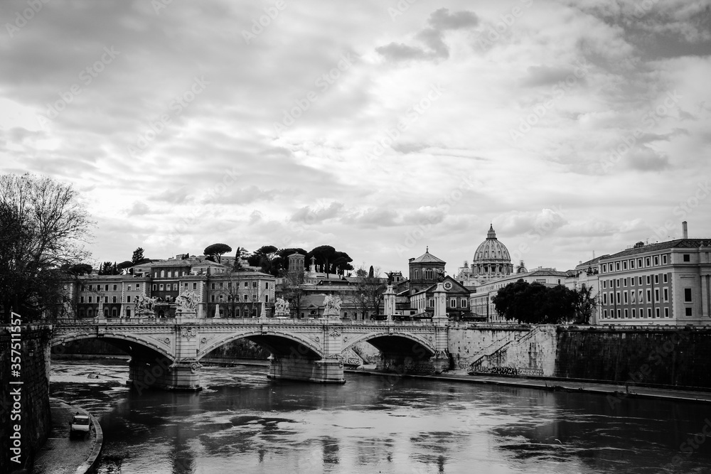 View of Tiber River, bridge Vittorio Emanuele II and Saint Peter Cathedral, Rome, Italy