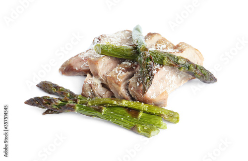 Tasty meat with asparagus isolated on white