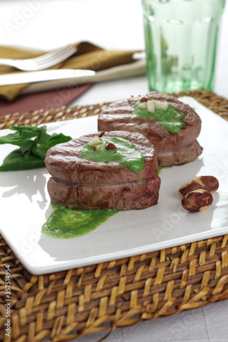 fillet medallion with spinach sauce and Brazil nuts