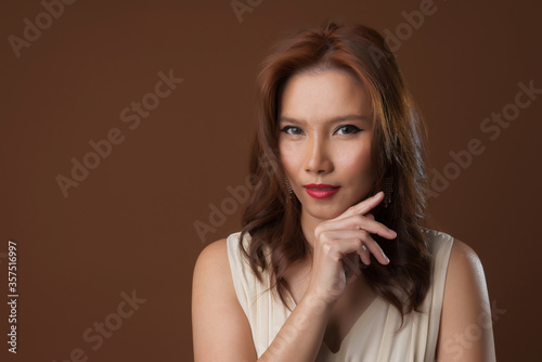 beautiful woman, pretty girl on brown background, asian woman 