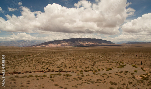 Arid landscape. Aerial view of the colorful hill in the desert of Los Cardones National Park in Salta, Argentina. 