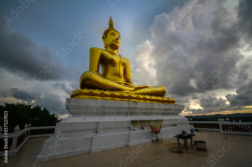 outdoor golden buddha statue in thailand