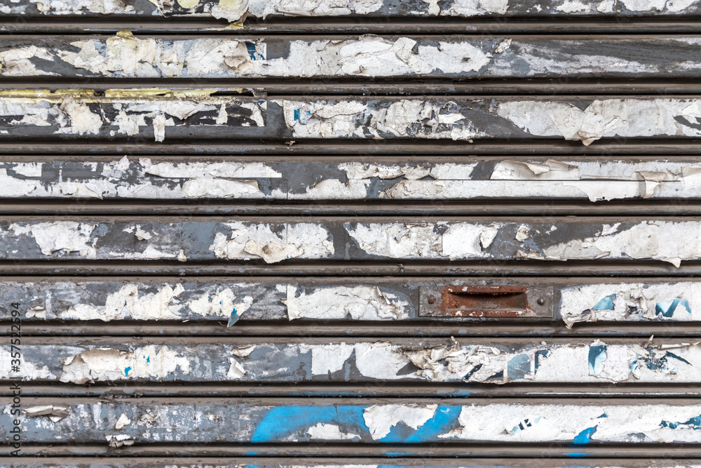 abstract background of old metal steel sliding door with rust 