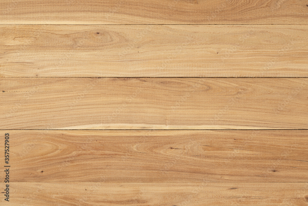 Elm wood table background. The wood of elm has grain. Elm wood table background. The wood of elm has grain.