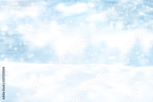 winter christmas abstract background with snow, snowflakes beautiful blurred  © Khaohom Mali