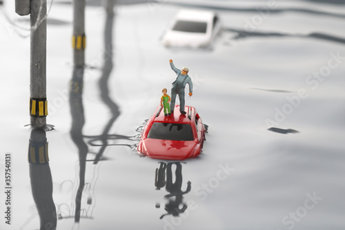 洪水で動けなくなった自動車と電信柱のジオラマ © Free1970