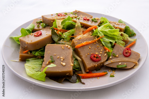 Seasoned Acorn Jelly Salad which is called Muk made of buckwheat