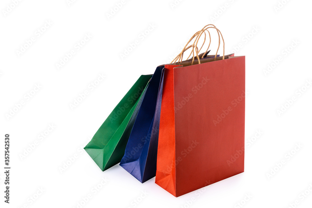 Group of colorful paper shopping bags isolated on white background