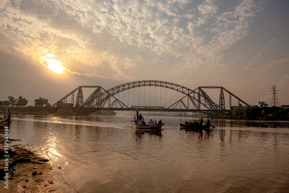 sunset with steel bridge and clouds over the sky, The Lansdowne Bridge ...