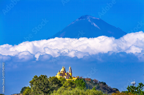 Colorful Yellow Our Lady of Remedies Church Volcano Popocatepetl Cholula Mexico photo