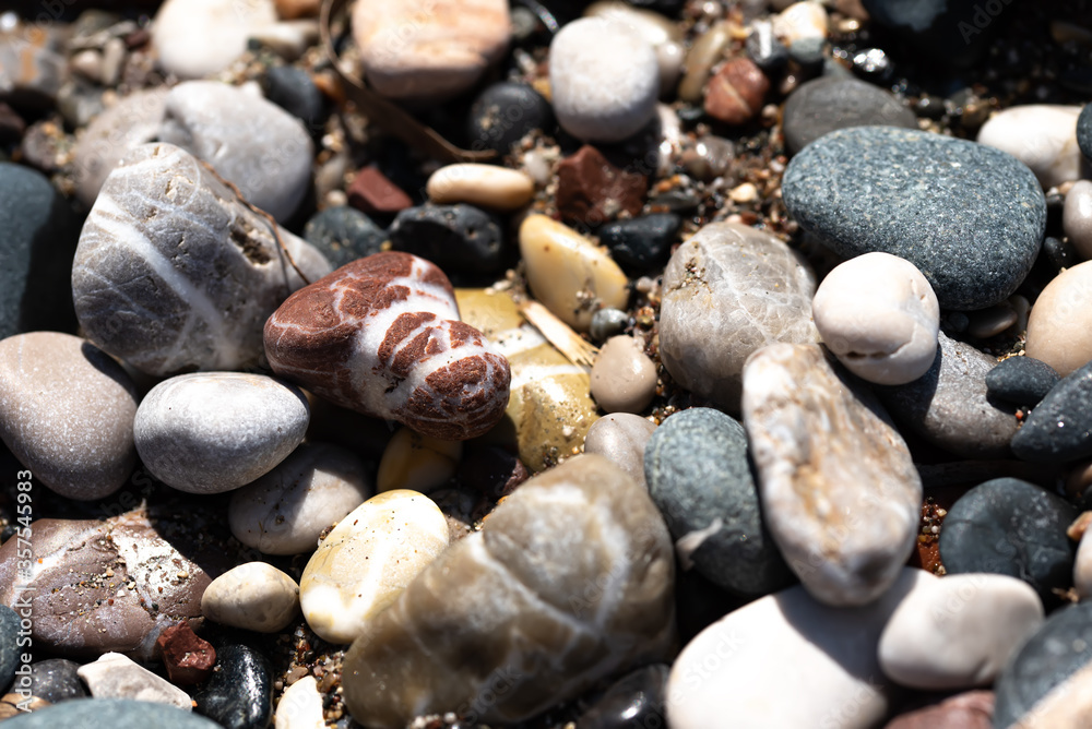 Colour different stones and pebbles on the seaside