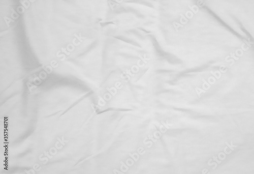 Crumpled light grey fabric background. abstract background.