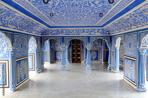 Fototapeta The Blue Palace in Chandra Mahal are beautifully adorned with blue and white coloured rooms in city palace jaipur, rajasthan, india April 2018
