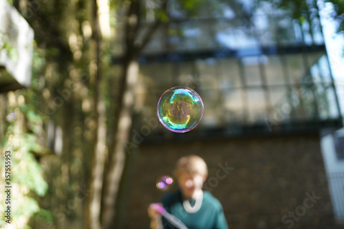 soap bubbles flying on a blurry background