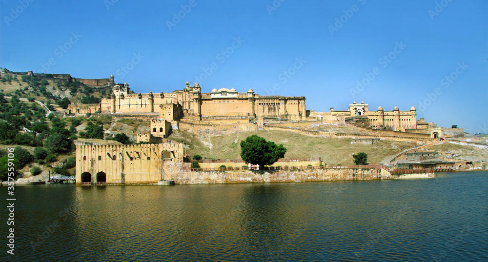 Jaipur,Rajasthan,India - January,2012. Located high on a hill. the fort overlooks Maotha Lake. Beautiful morning view of famous Amer fort of Jaipur. The beautiful architecture of fort.