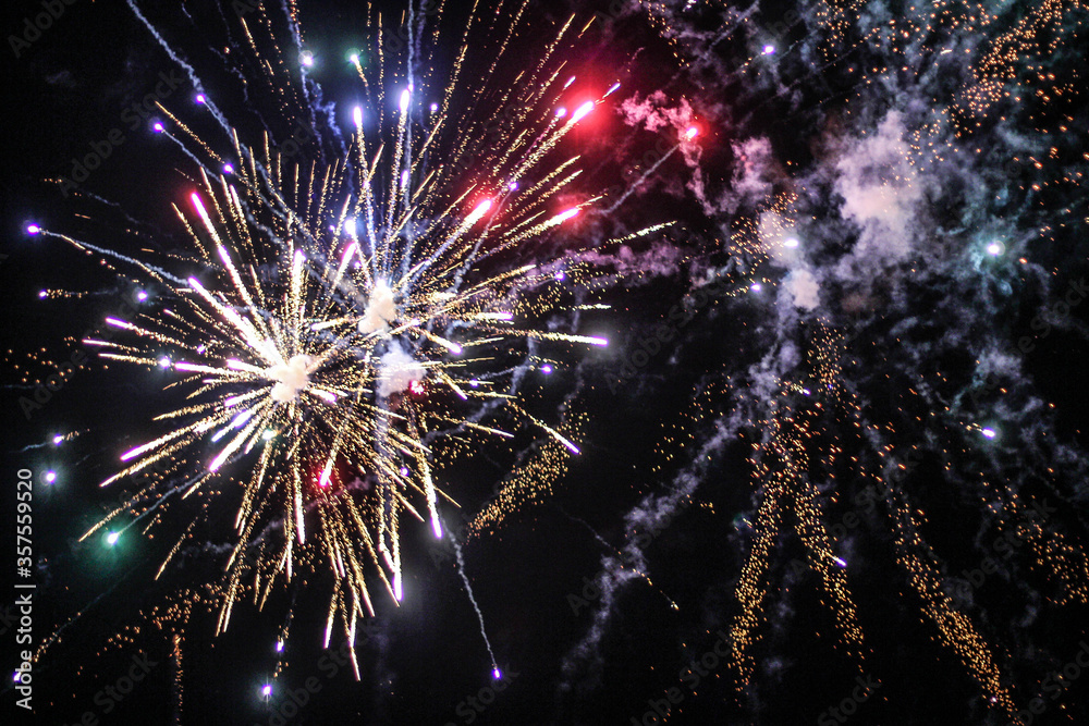 Fototapeta premium Beautiful fireworks in the night sky