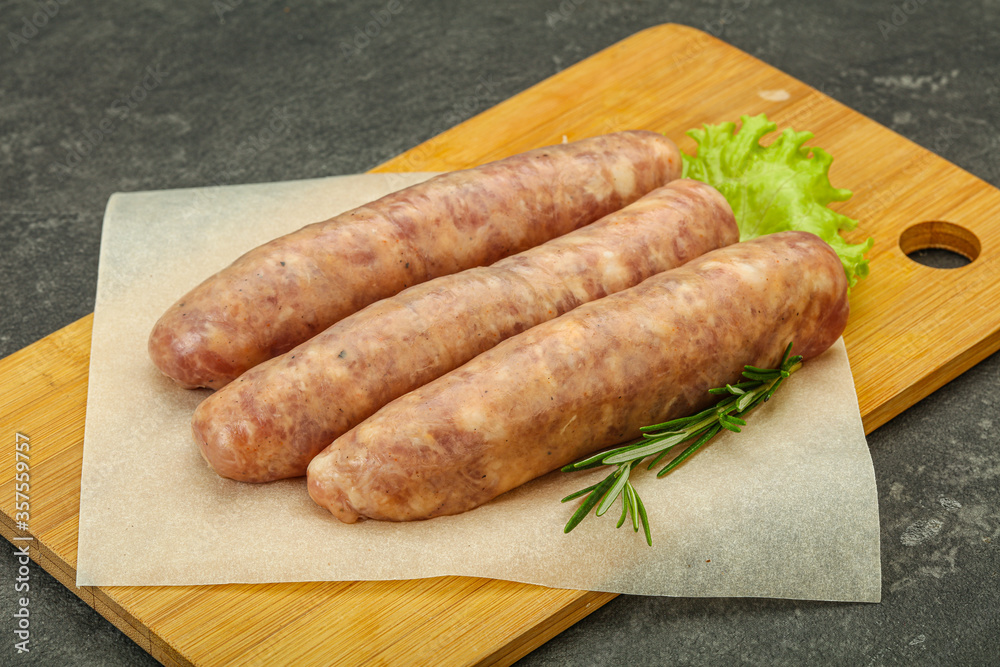 Raw pork meat sausages for grill Raw pork meat sausages for grill